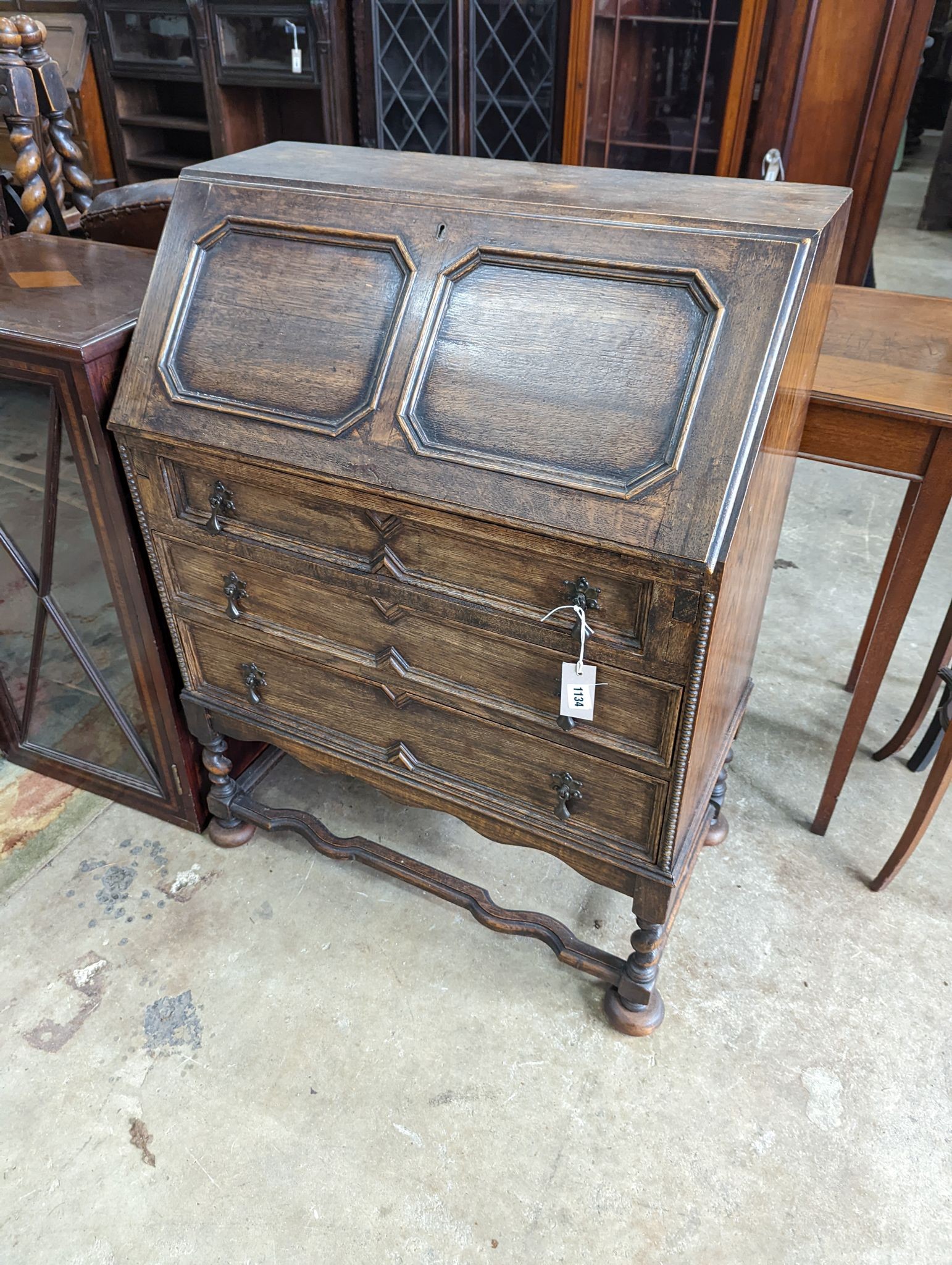 An early 20th century oak bureau, width 73cm, depth 41cm, height 99cm